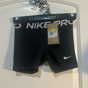 Kids nike pros size small